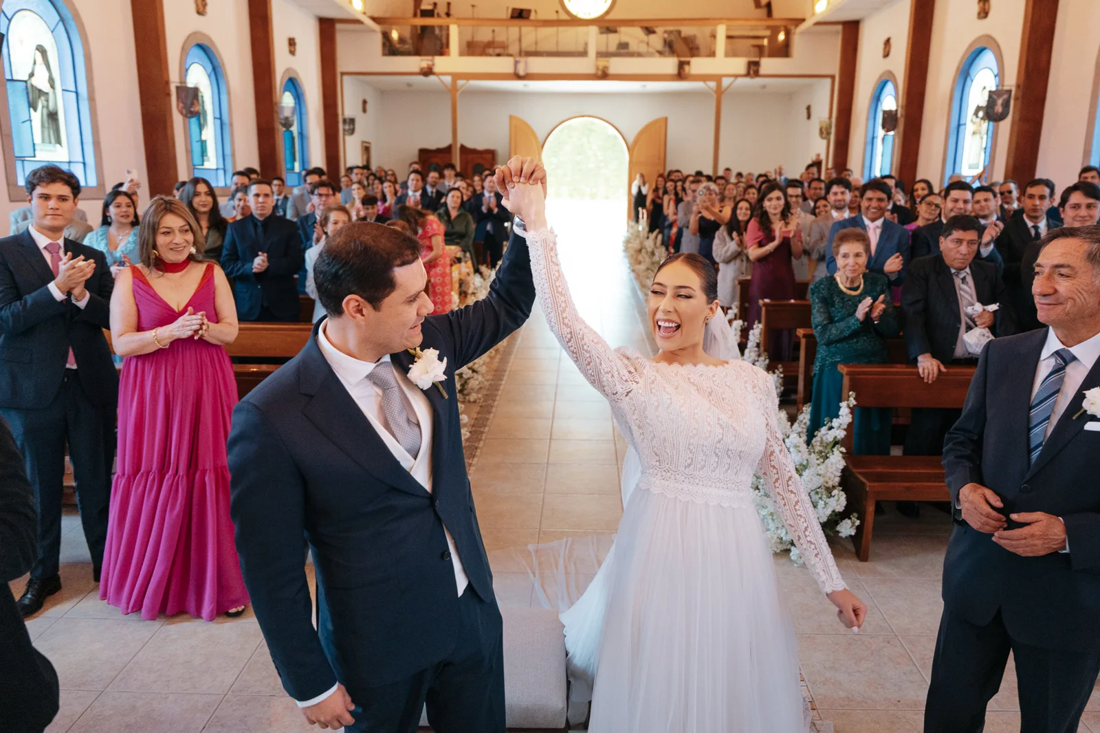 Mel and Jesus celebrating their wedding ceremony